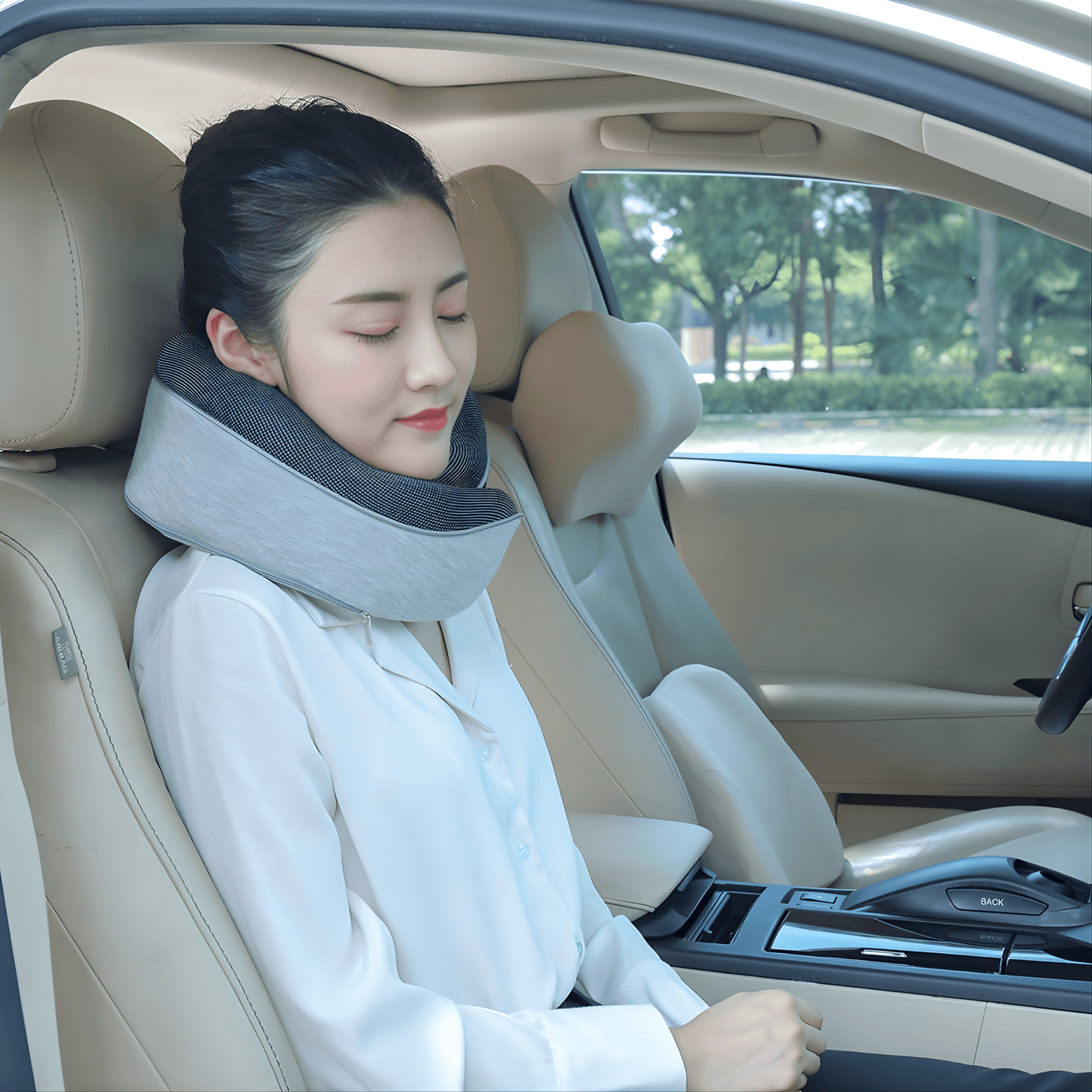 Memory Foam Travel Neck Pillow Set — 360° Support with Sleep Mask, Ear Plugs & Carry Bag - woman using it for car travel